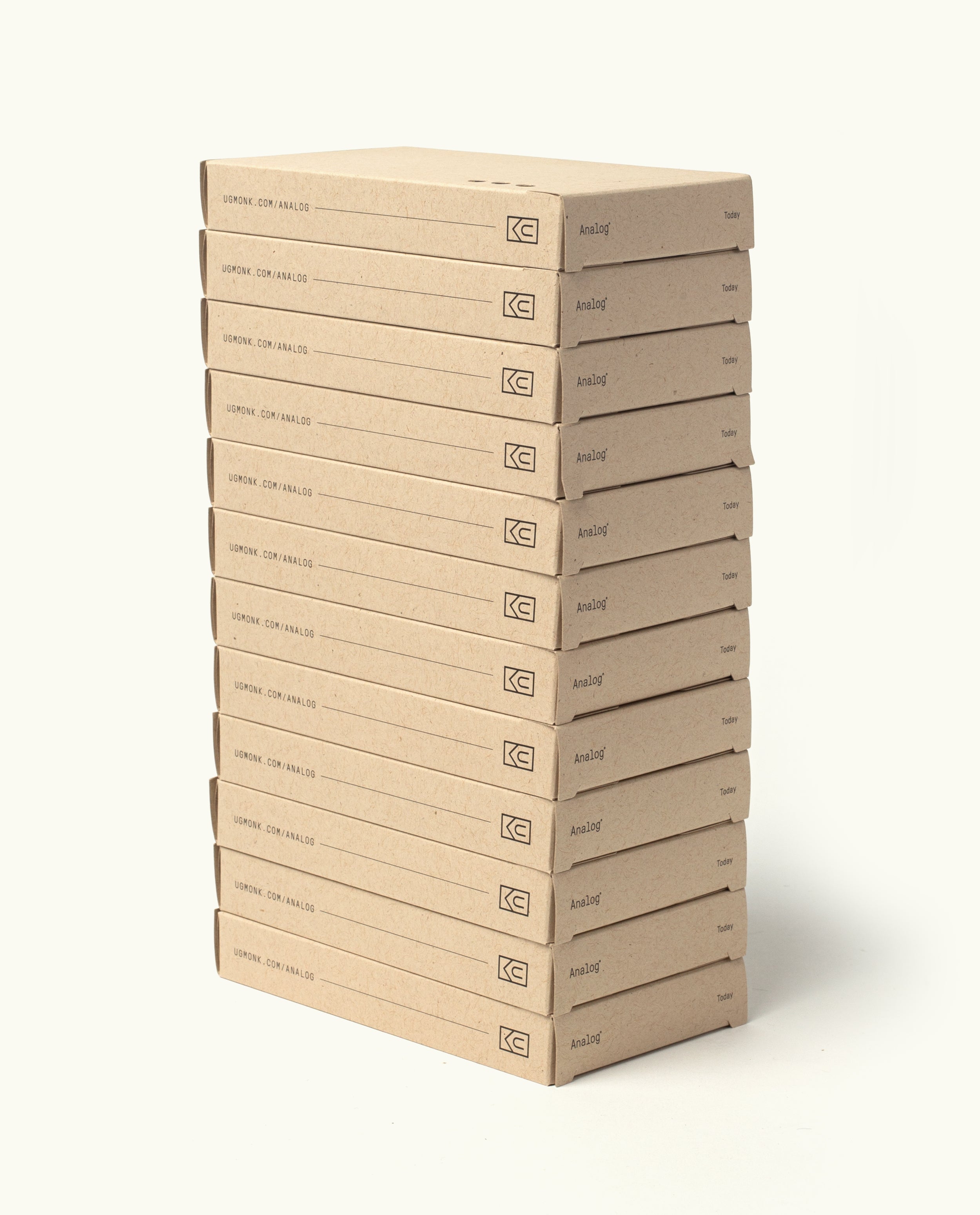 A stack of twelve identical brown cardboard boxes labeled "Analog Today Cards" stands upright on a light background—perfect for storing or organizing your 3x5 note cards.