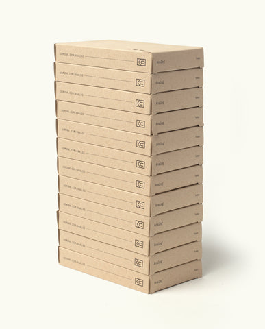 A stack of twelve identical brown cardboard boxes labeled "Analog Today Cards" stands upright on a light background—perfect for storing or organizing your 3x5 note cards.