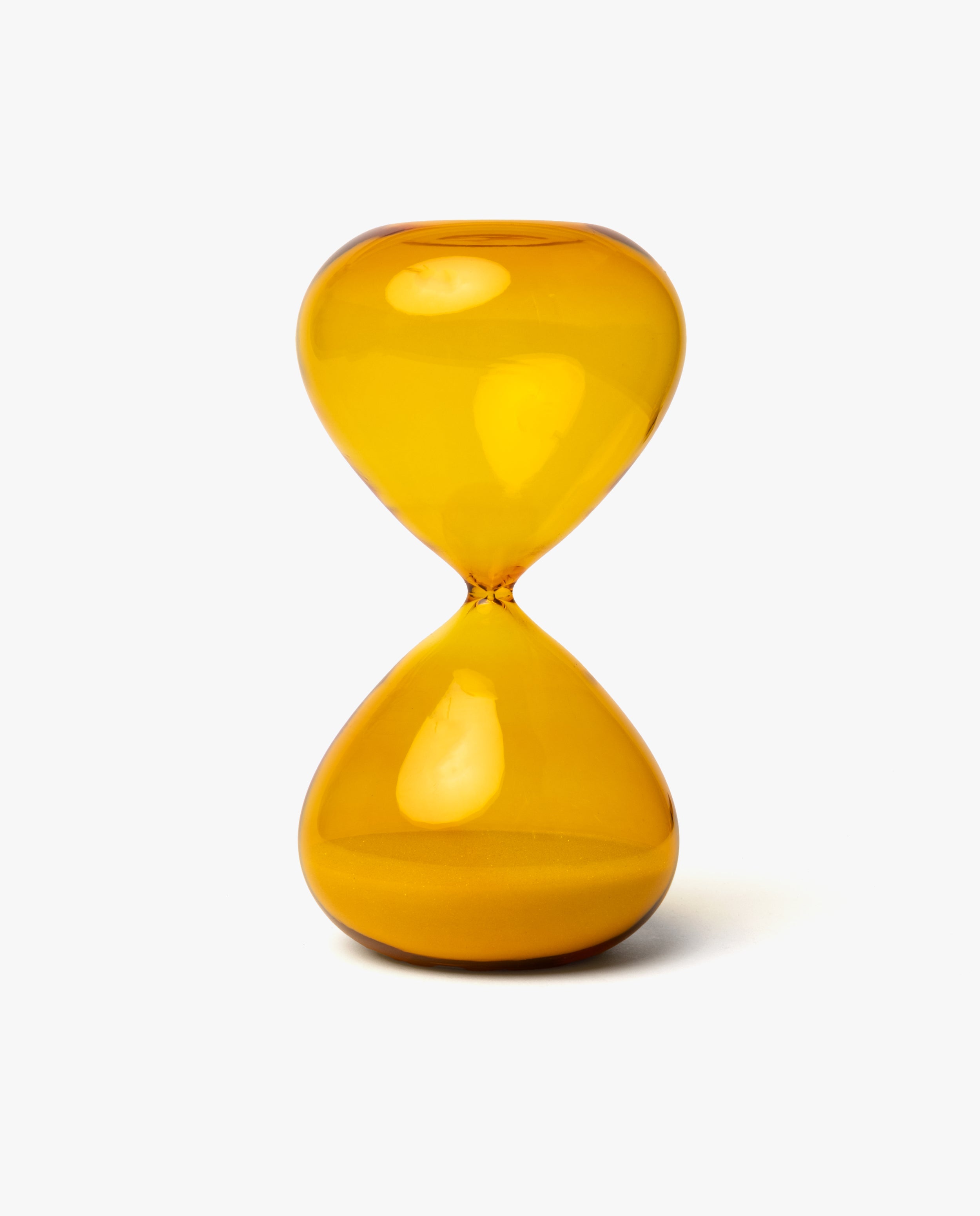 The 25 Minute Hourglass (Amber) is a hand-blown glass timer with amber sand, standing upright on a plain white background—ideal for precise 25-minute Pomodoro sessions.