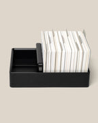 A black rectangular Analog Archive (Black Aluminum) card organizer holding a stack of index cards separated by metal tabs.