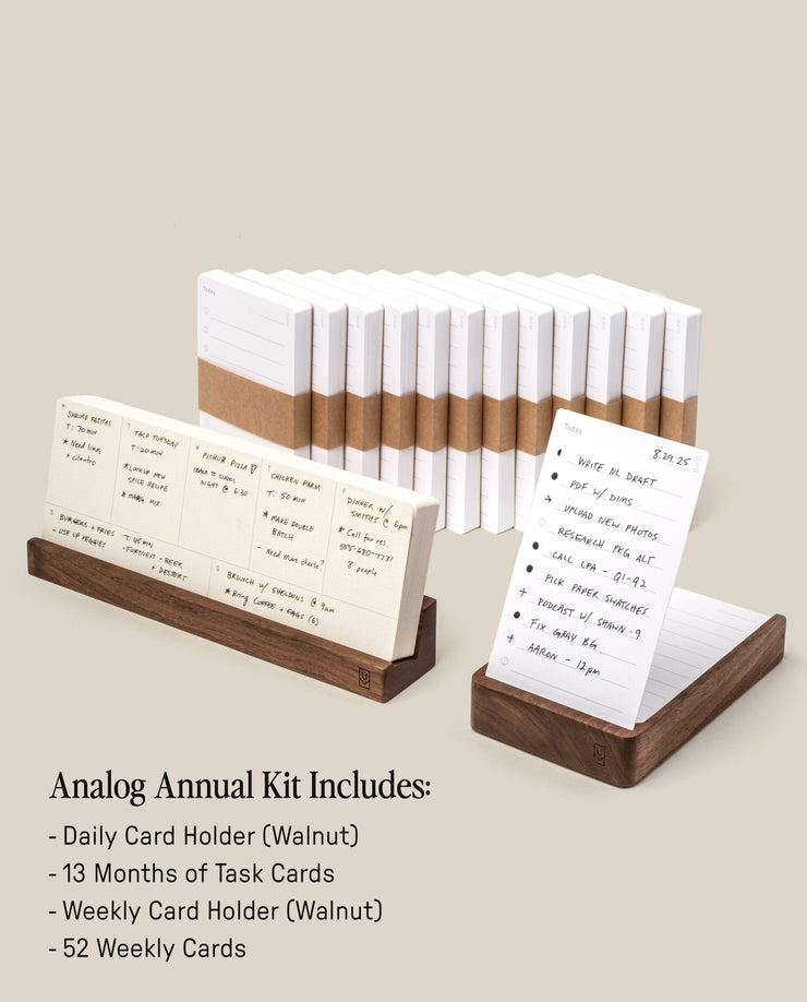 The image shows the Analog Annual Kit (Walnut) with walnut Daily and Weekly Card Holders, white cards (13 monthly, 52 weekly), two holders, and a detailed item list included in the set.