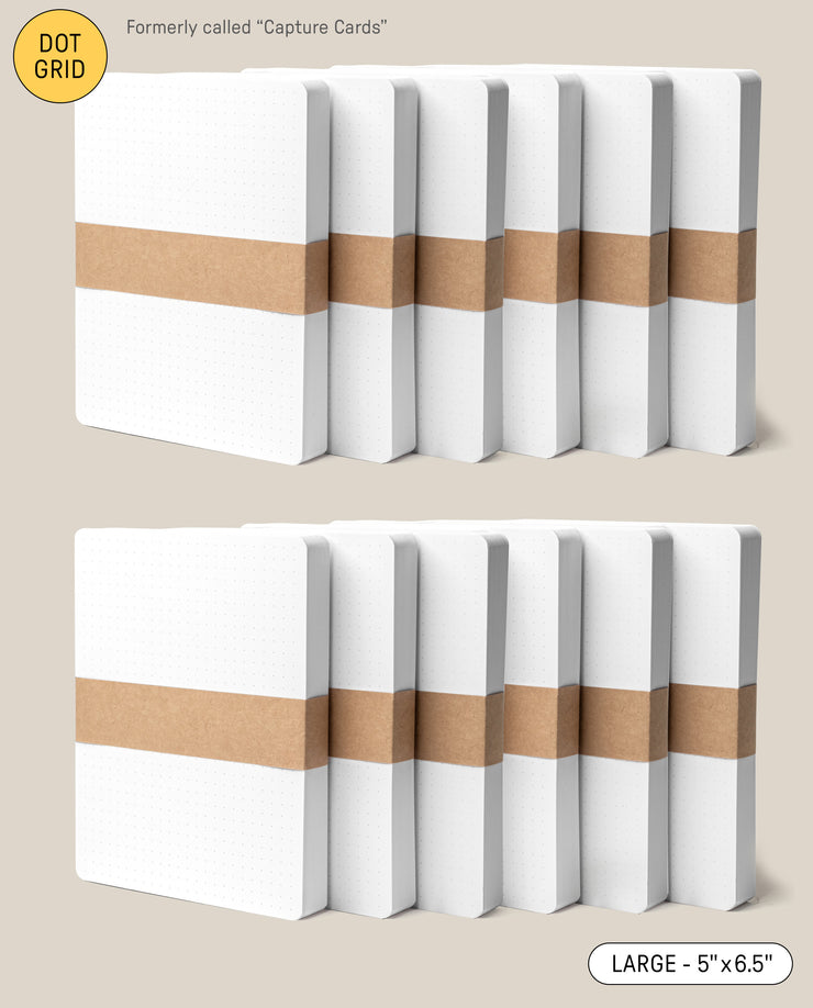 Two rows of Analog Dot Grid Cards - Large (12-Pack), each with a brown paper band. The label reads "Dot Grid" and "Large – 5” x 6.5”," ideal for note taking on premium card stock; formerly Capture Cards.