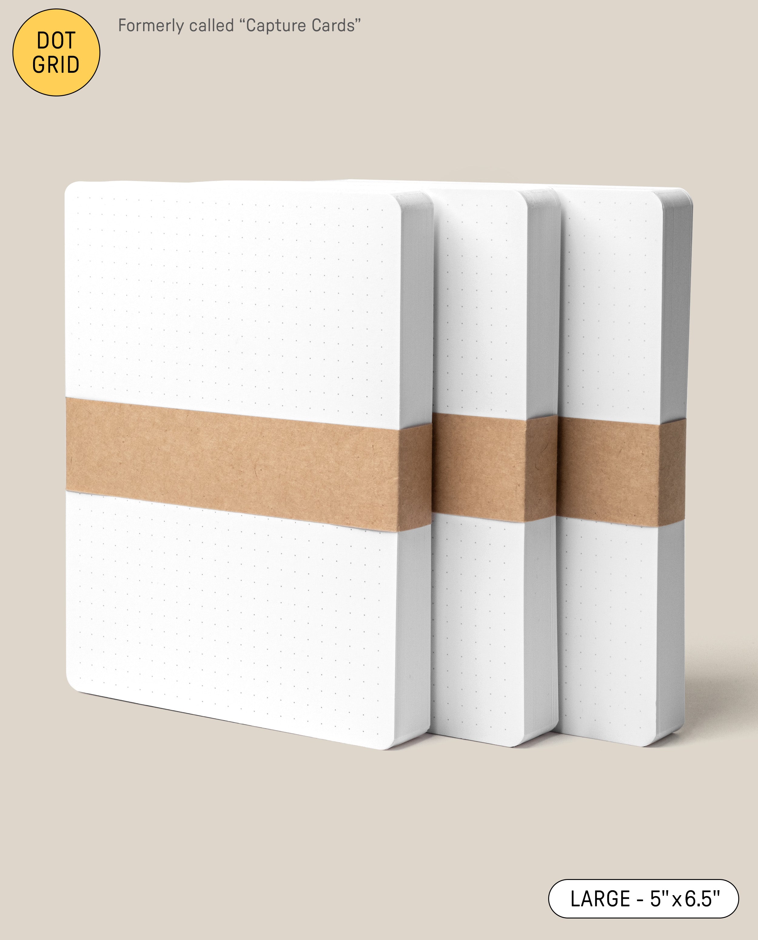 Three Analog Dot Grid Cards - Large (3-Pack) are stacked and secured with brown paper bands on a light beige background. A label displays their LARGE 5” x 6.5” size, making them ideal for note taking.
