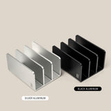 Two Analog Card Organizer trays—one silver, one black aluminum—each with three slots, are displayed side by side on a beige background. Labels indicate SILVER ALUMINUM and BLACK ALUMINUM card trays.