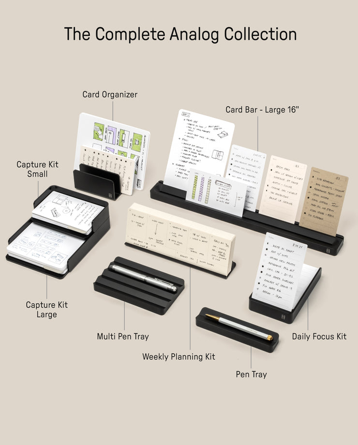 A neatly arranged display of The Complete Analog Collection (Black Aluminum), featuring card organizers, card bars, a planning kit, two capture kits, multi pen trays, and a daily focus kit on a beige background.