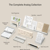 A display of The Complete Analog Collection (Silver Aluminum)—including card organizers, capture kits, pen trays, and a weekly planning kit—arranged neatly on a light surface with labeled descriptions.