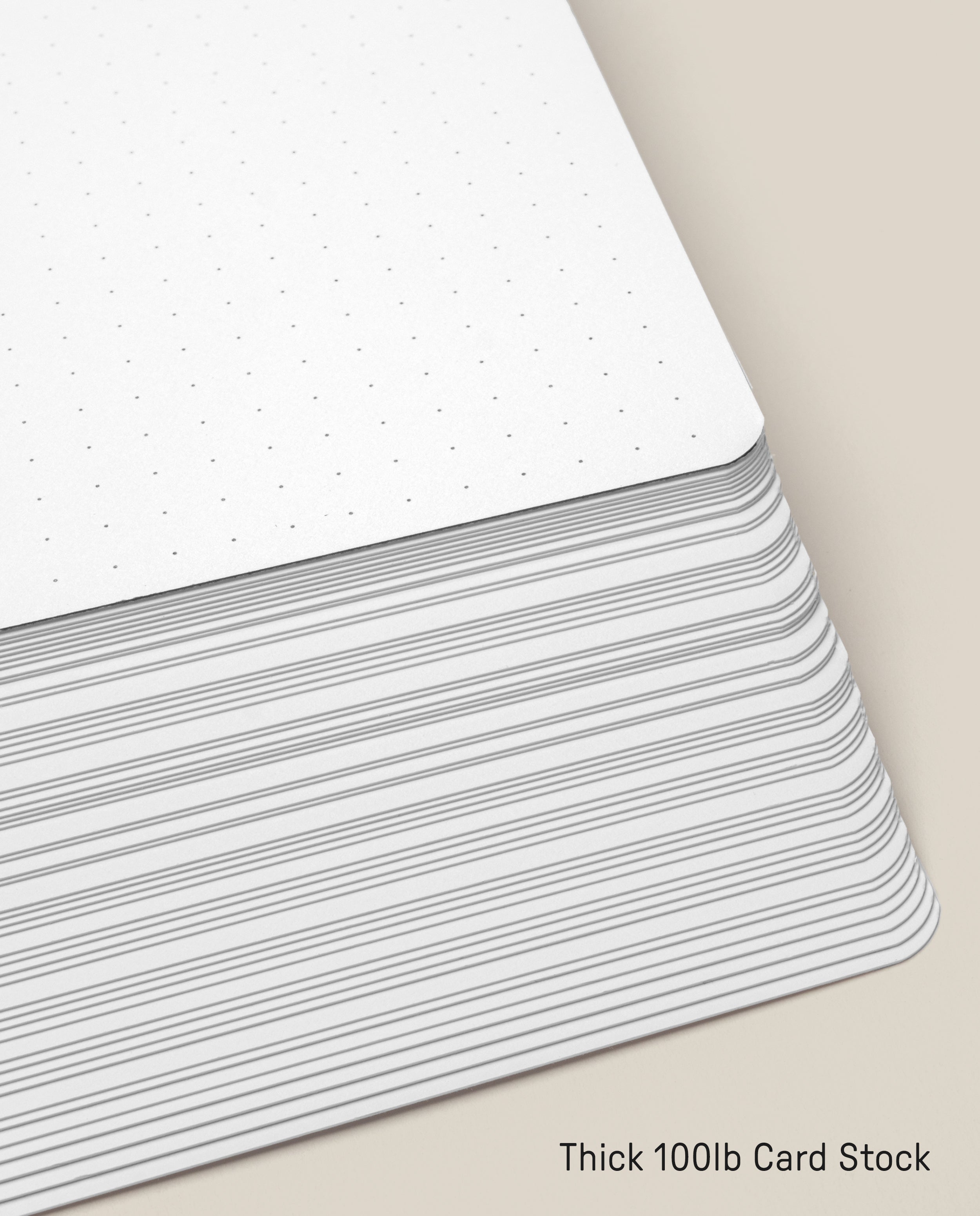 A 12-pack of Analog Dot Grid Cards - Large, featuring thick white cards with a dot grid and rounded corners, made from 100lb card stock.