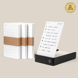 The Analog Daily Focus Kit + 3 Refills (Black Aluminum) includes three notepads wrapped in brown paper next to a black aluminum card holder showing a handwritten to-do list, with a #1 Best Seller badge in the top right corner.