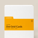 A pack of Analog Dot Grid Cards - Large with a yellow label, featuring 50 white uncoated 5x6.5" cardstock cards with a faint dot grid and rounded corners—ideal for sketching—shown on a neutral background.