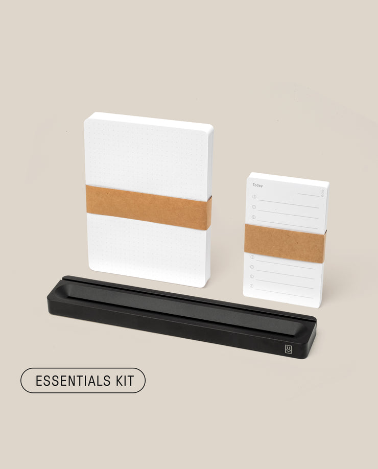 The Analog Card Bar - Essentials Kit (Black Aluminum) includes a large dotted notepad, a to-do list notepad, and a sleek black pen holder on a light beige background—modern essentials for any desk.