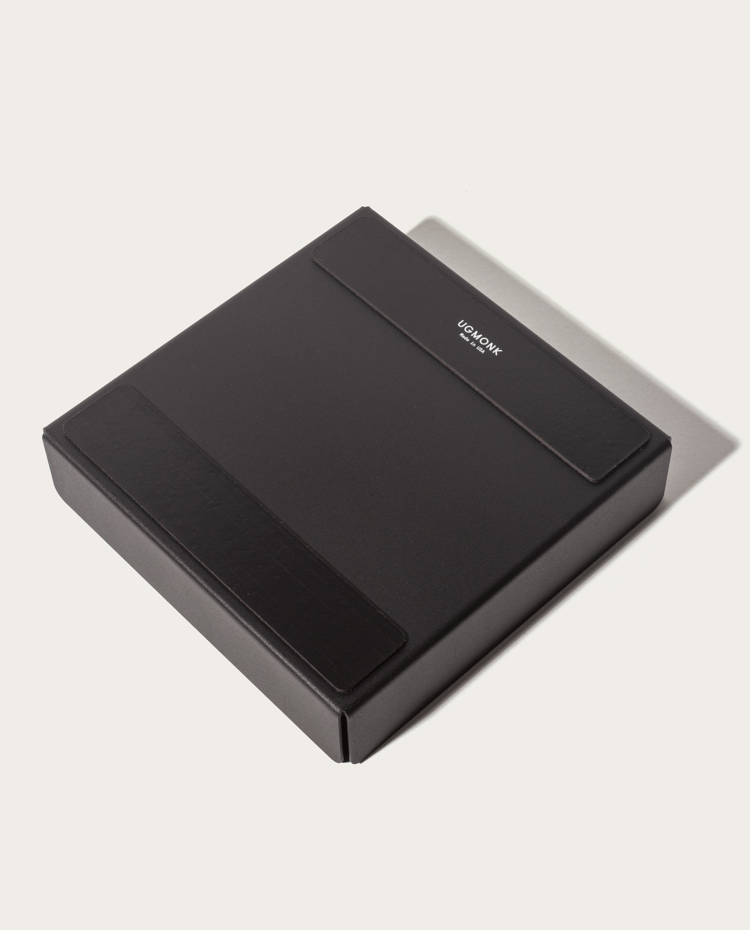 The Gather Large Tray (2x2 - Black) is a closed, square valet tray with a magnetic bottom and "UPDOWN" in small white letters near the top center, shown on a light background.