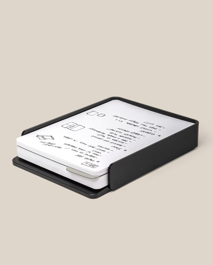 The Analog Capture Kit - Large (Black Aluminum) features a sleek black aluminum card tray holding large dot grid cards with simple black text and line drawings, displayed on a plain beige background.