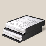 The Analog Capture Kit - 2 Large (Black Aluminum) is a black, two-tiered organizer tray holding paper stacks and dot grid cards with handwritten notes and diagrams, shown against a neutral background.