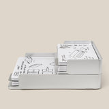 The Complete Analog Collection (Silver Aluminum) organizes several white cards with black hand-drawn sketches and notes, all displayed against a plain beige background.