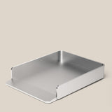 The Analog Capture Kit - Large (Silver Aluminum) is a rectangular tray with raised sides and an open front, ideal for organizing large dot grid cards, shown on a light beige background.