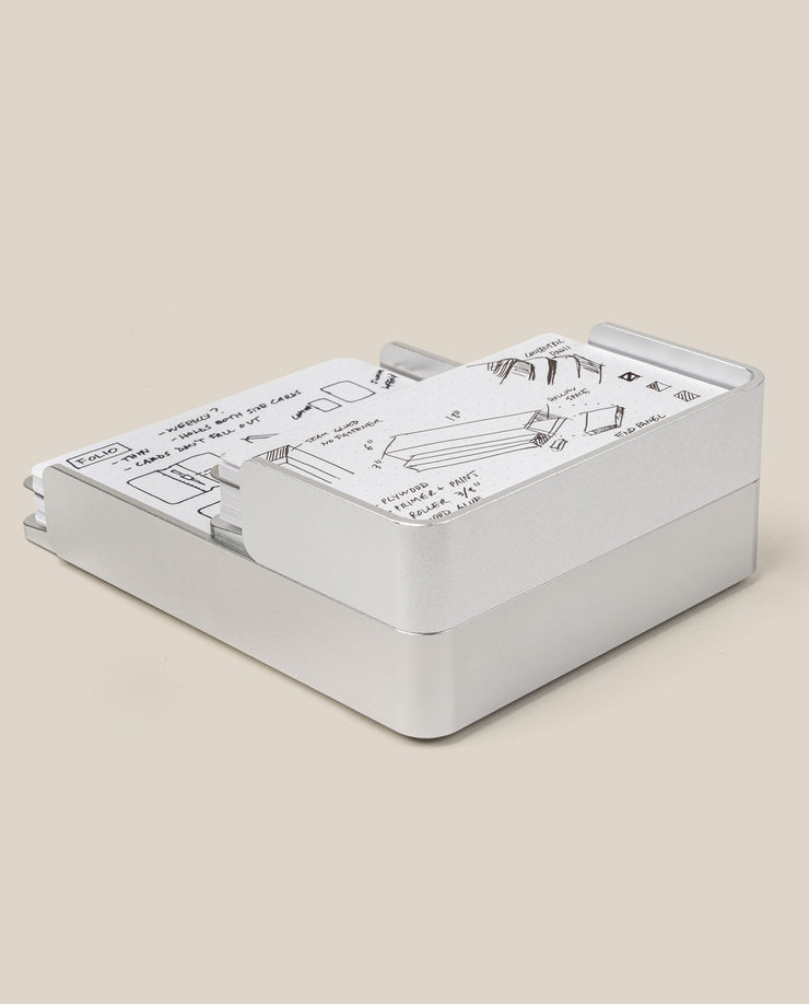 The Analog Capture Kit - Small & Large (Silver Aluminum) features a sleek card holder with illustrated instruction cards and Dot Grid Cards, some partially pulled out, displayed against a neutral background.