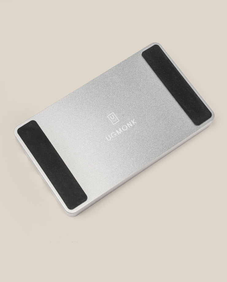 The Complete Analog Collection (Silver Aluminum) desktop organizer features two black non-slip grip strips and a centered UGMONK logo, displayed on a light beige surface.