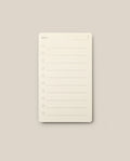 Analog - Next Cards: Notepads featuring the word “Next” at the top and eight numbered lines for writing tasks or notes, set against a plain beige background—perfect for goal setting or capturing ideas on Analog - Next Cards.
