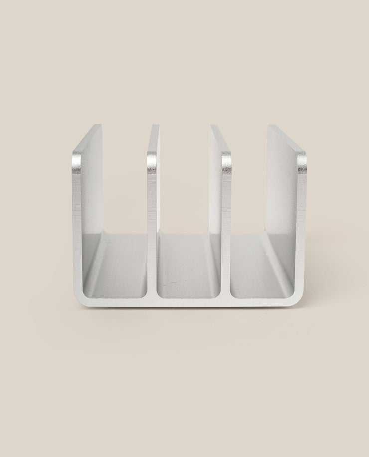The Analog Card Organizer (Silver Aluminum) is a desktop organizer with three vertical slots, shown from the front on a plain light beige background.