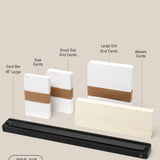 The Analog Card Bar - Pro Kit (Black) includes task cards, small and large dot grid cards, weekly cards, and a 16 large card bar, all displayed neatly on a beige background.