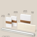 The Analog Card Bar - Pro Kit (Silver) is neatly arranged with 16" silver bar, Task Cards stacks, small/large Dot Grid Cards, and weekly cards labeled above on a light beige background.