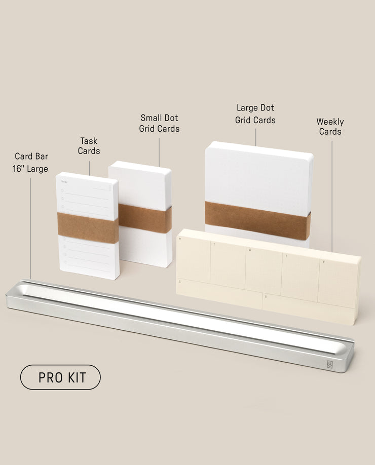 The Analog Card Bar - Pro Kit (Silver) is neatly arranged with 16" silver bar, Task Cards stacks, small/large Dot Grid Cards, and weekly cards labeled above on a light beige background.