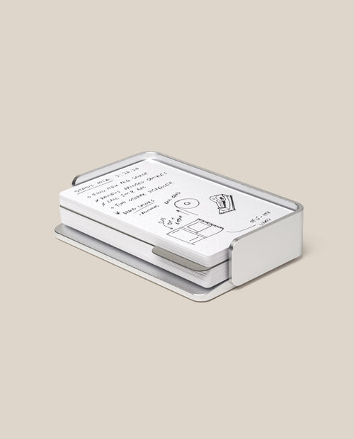 The Analog Capture Kit - Small (Silver Aluminum) features white dot grid cards with black handwritten notes and drawings, neatly arranged in a sleek silver aluminum tray on a plain beige background.