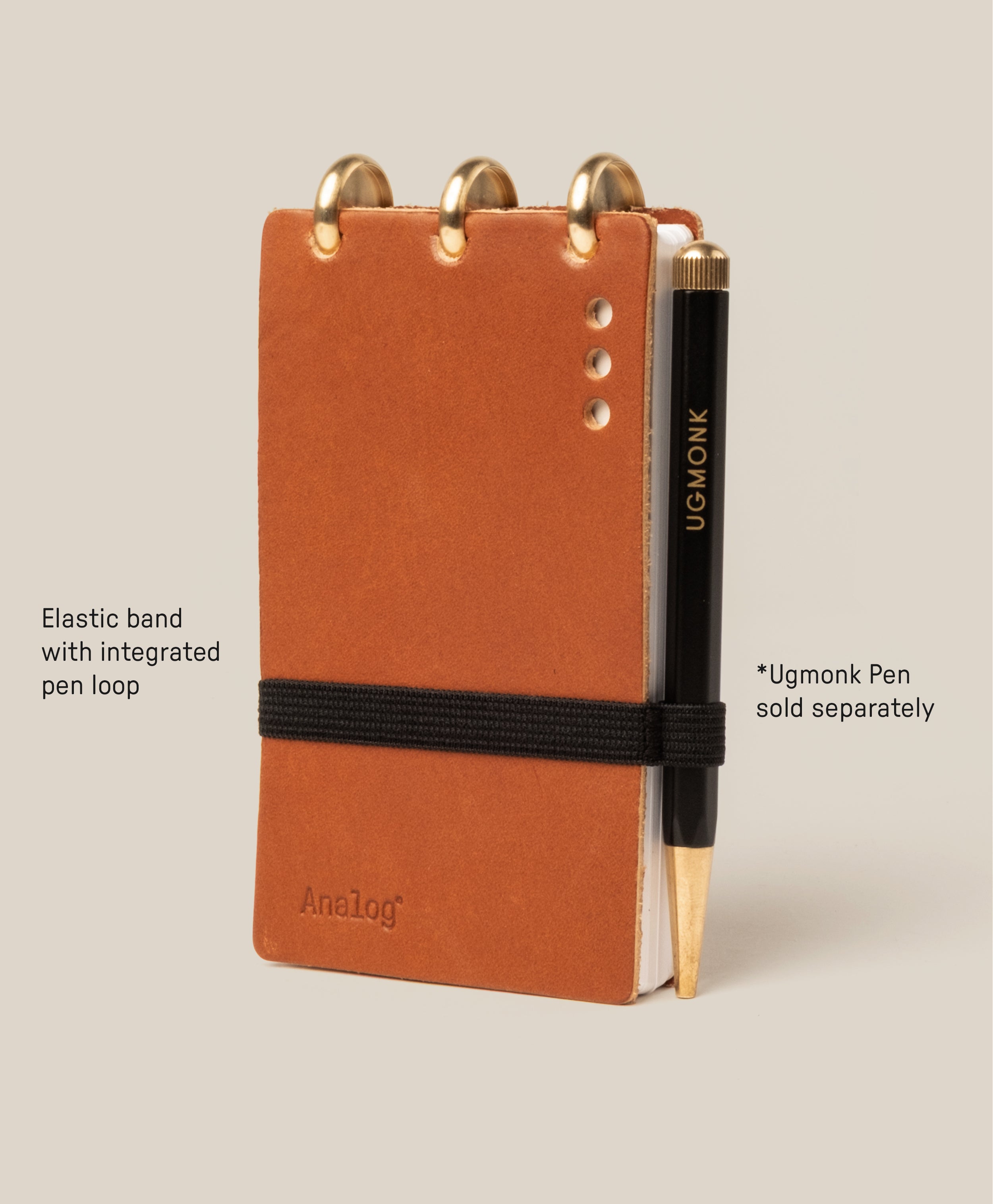 Brown notebook with elastic band and pen loop, Ugmonk pen included.