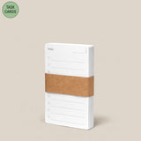 The Analog - Task Cards (1-Pack) features a stack of white cards labeled "Today" with checkboxes, bound by a brown paper band on a beige background. A green circle at the top left says "TASK CARDS—perfect for task prioritization.