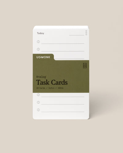A stack of Analog Task Cards - Small with a minimalist design, made from uncoated 3x5" 100lb cardstock, includes spaces for tasks and a green label showing 33 cards.