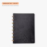 The Warehouse Item - Discbound Heirloom Journal (Black/Brass) is shown centered on a white background with a "WAREHOUSE SALE – 50% OFF" label above. Item may show minor cosmetic imperfections.