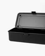 The Toyo Steel Stackable Storage Box T-190 (Black) is a black rectangular steel toolbox with a hinged lid open, showing an empty interior, set against a plain white background.